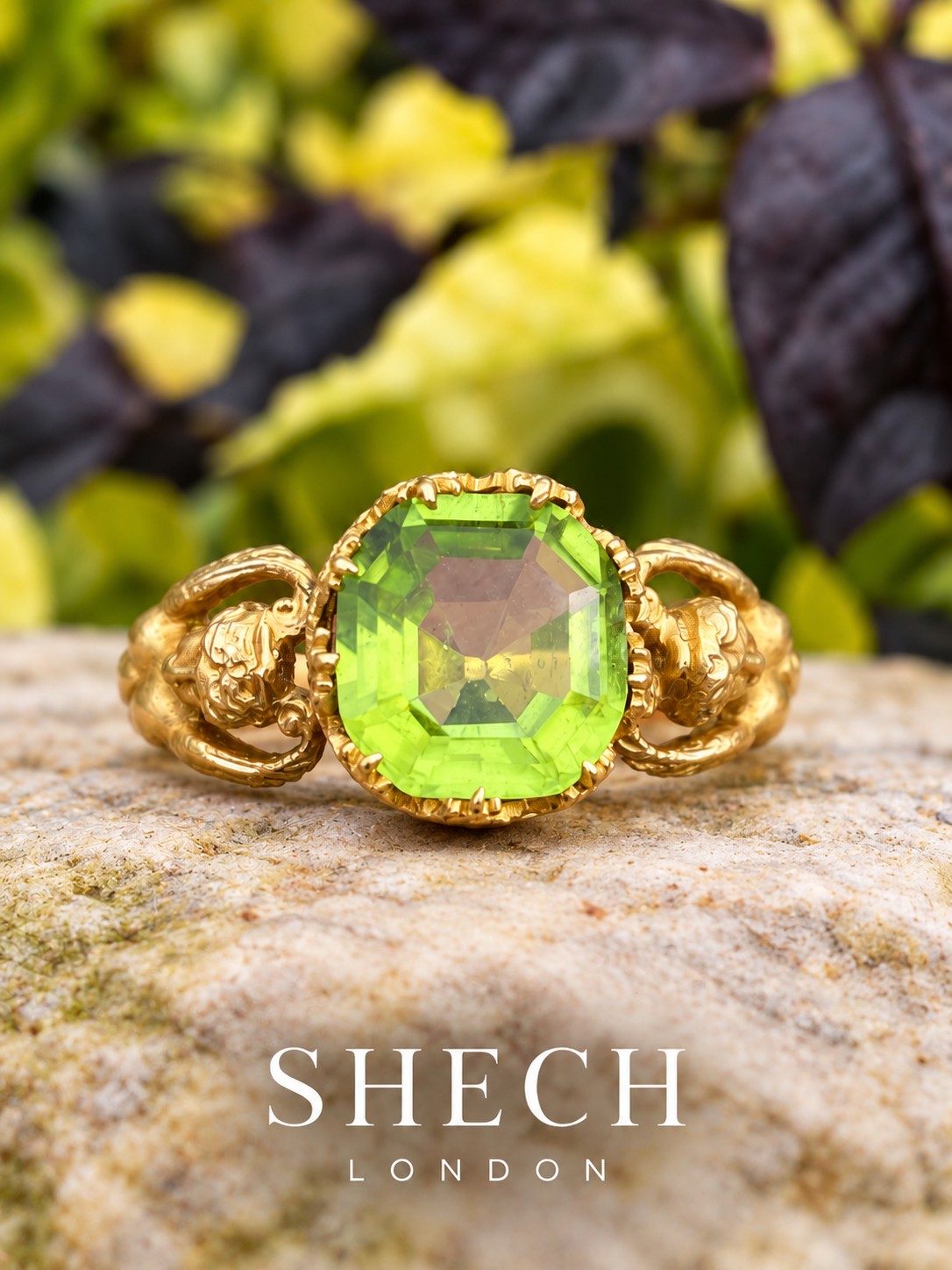 An exceptional Art Nouveau ring crafted in 18k gold, centering a vivid natural peridot of remarkable brightness and colour