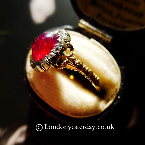EDWARDIAN 18CT GOLD AND SILVER NATURAL CABOCHON RUBY DIAMOND RING