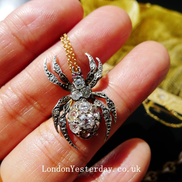 VICTORIAN 18CT GOLD AND SILVER OLD CUT DIAMOND SPIDER PENDANT WITH 18CT GOLD CHAIN