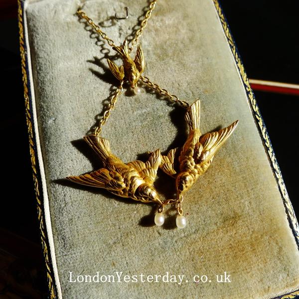 ART NOUVEAU 18CT GOLD SWALLOW PENDANT WITH 9CT GOLD CHAIN