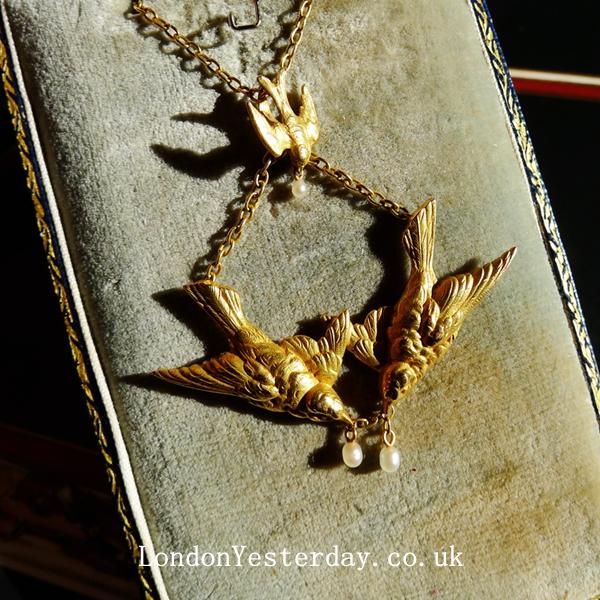 ART NOUVEAU 18CT GOLD SWALLOW PENDANT WITH 9CT GOLD CHAIN