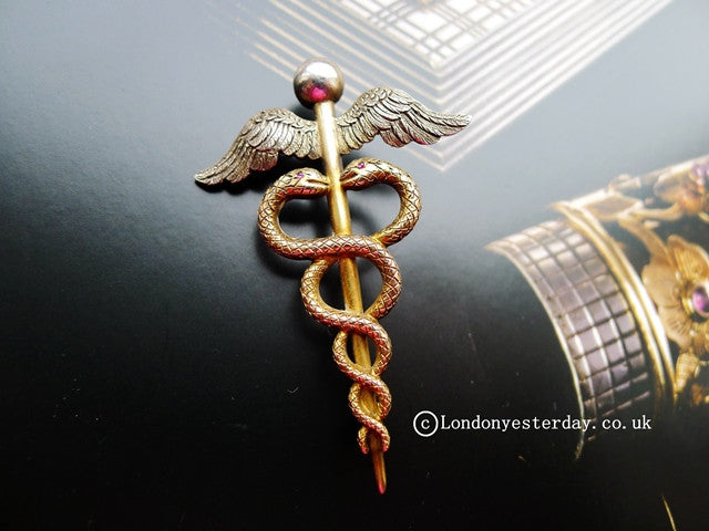 EDWARDIAN 18CT GOLD AND SILVER DOUBLE SNAKE CADUCEUS BROOCH