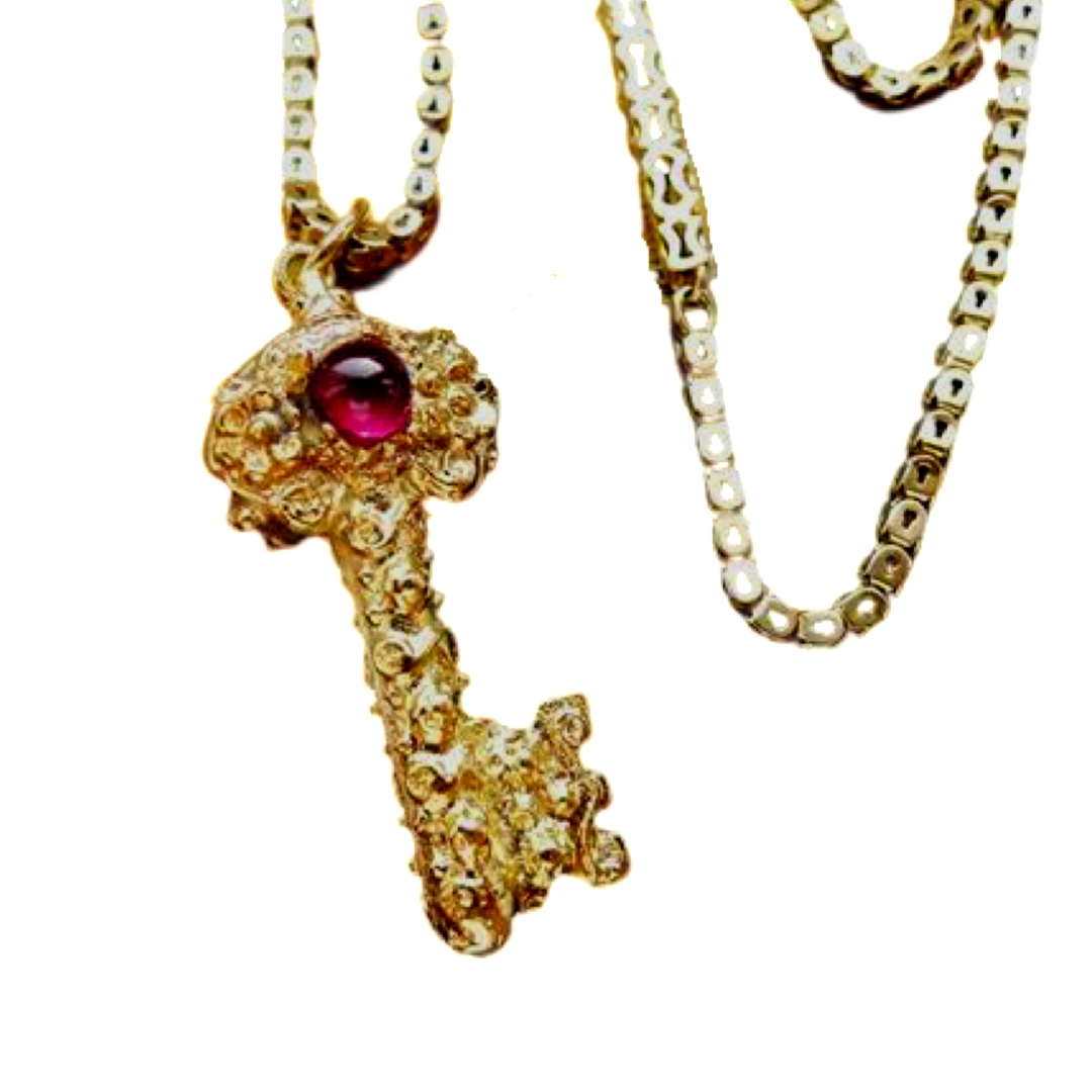 GEORGIAN 15CT GOLD NATURAL GARNET KEY PENDANT WITH 9CT GOLD CHAIN