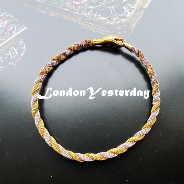 MID OF 20TH 18CT YELLOW GOLD PLATINUM NATURAL SAPPHIRE SNAKE BANGLE